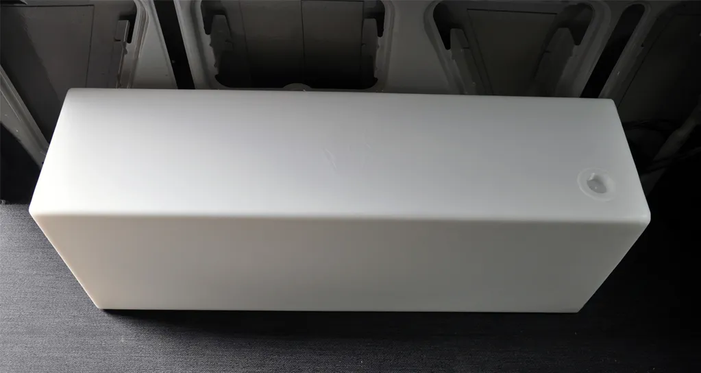 A large custom built campervan fresh water tank